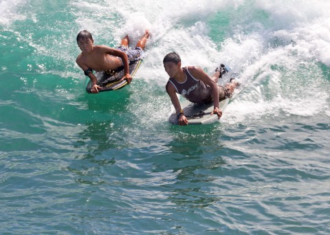 Boogie boarding in Waikiki